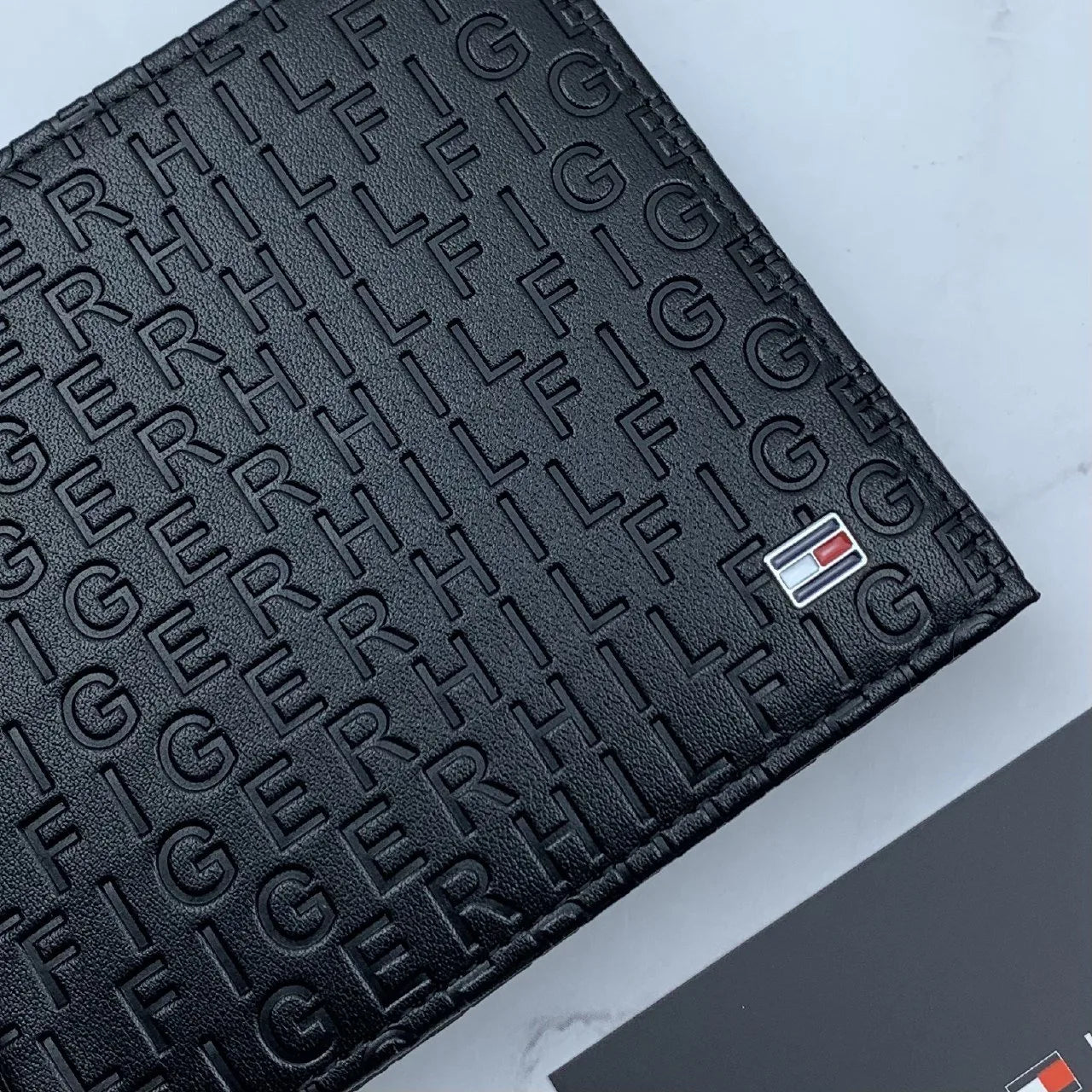 Tommy Hilfiger men's wallet, card holder, and keychain set.